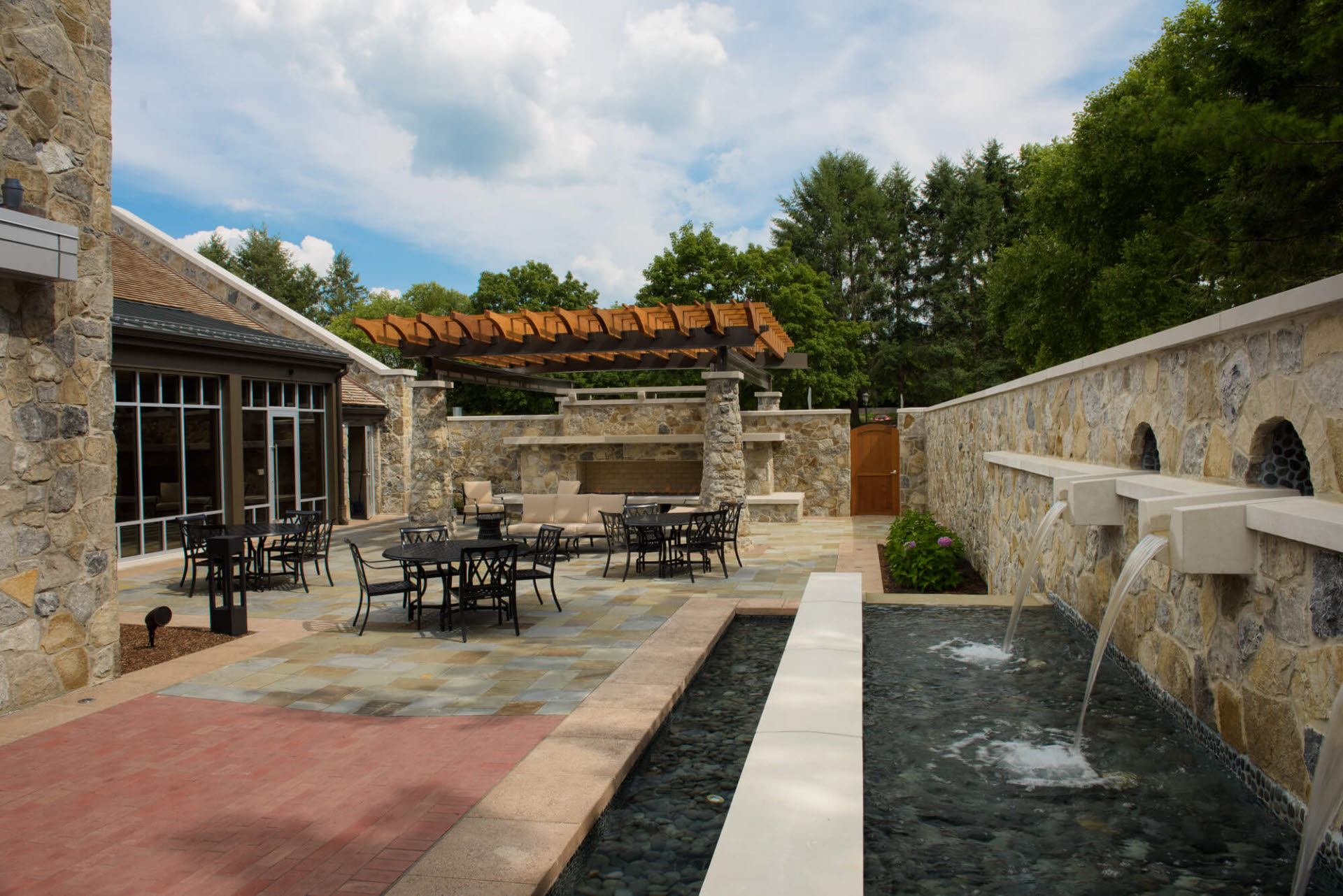 Courtyard with Fireplace, Fountain and Seating