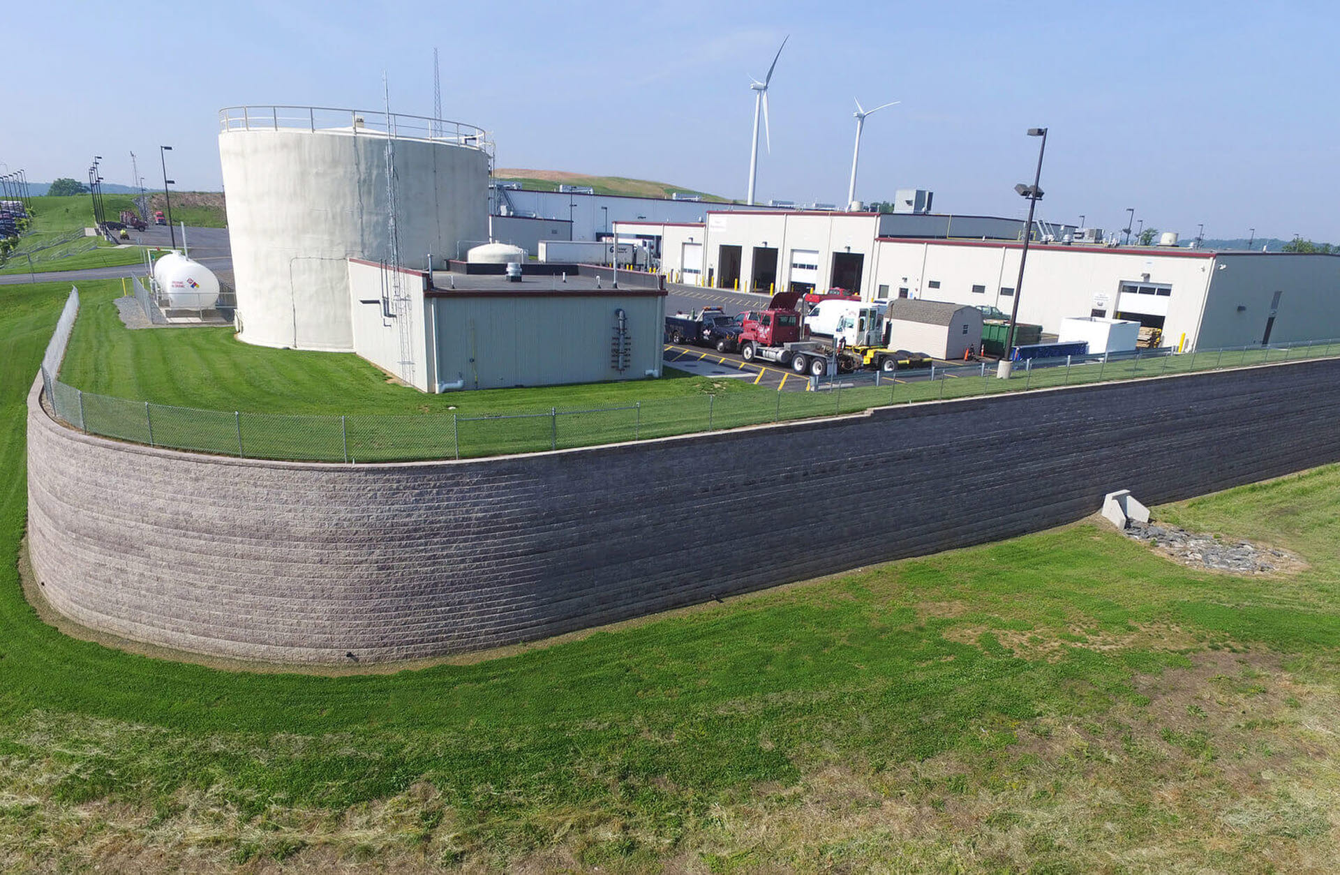 Exterior View of 300,000-gallon water storage tank / Maintenance Building - photo by York Building Products